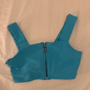 Alo Yoga Fast Bra in Bright Aqua. Airlift